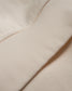 Close-up of a beige fabric texture