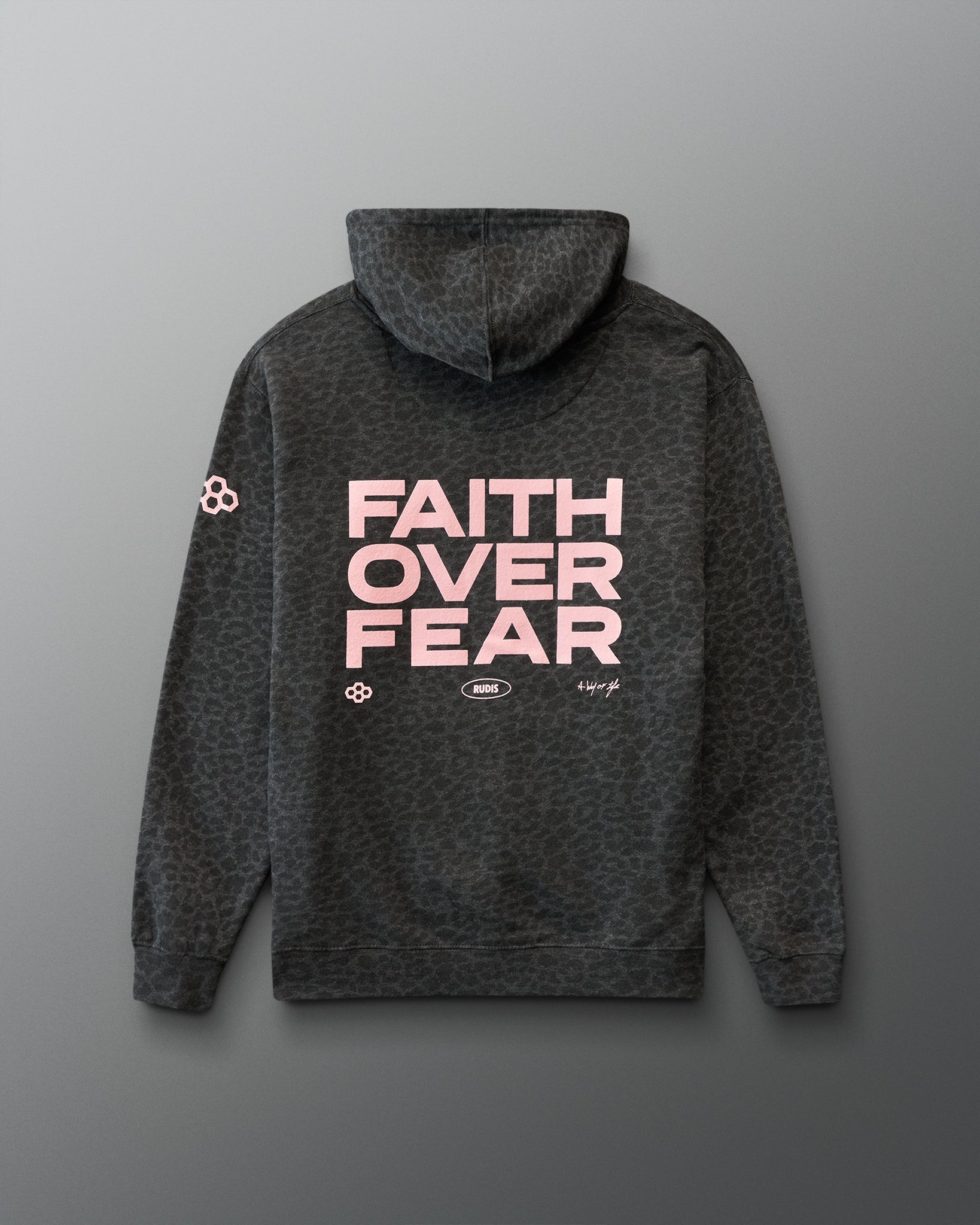 Gray hoodie with animal print and 'Faith Over Fear' text on the back against a gray background
