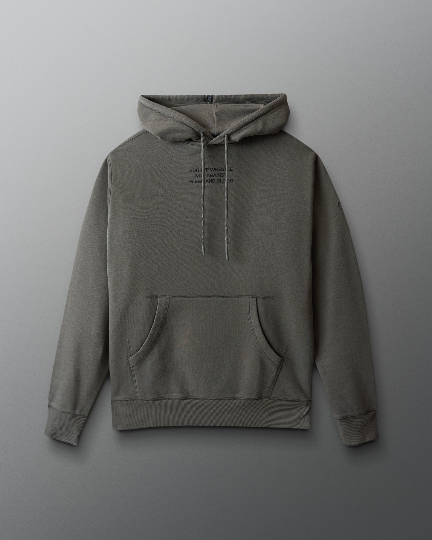 dark olive hoodie with text on the chest against a gray background