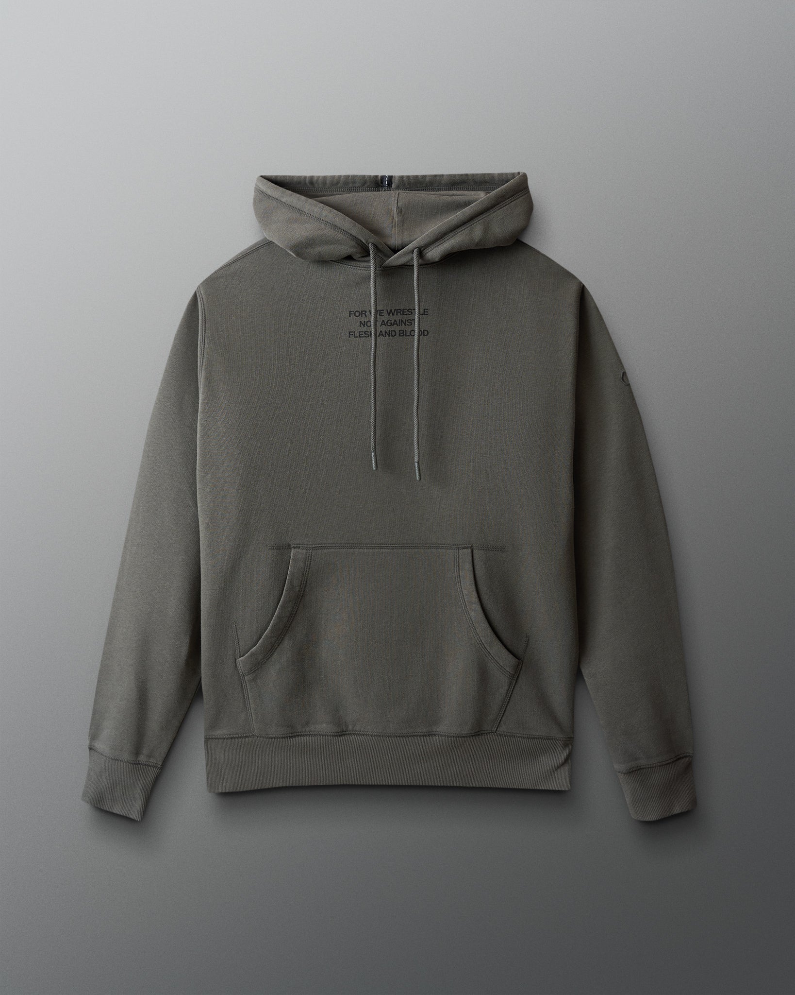 dark olive hoodie with text on the chest against a gray background