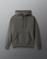 dark olive hoodie with text on the chest against a gray background