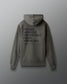 dark olive hoodie with text on the back against a gray background