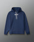A navy blue pullover hoodie with white drawstrings and 'RUDIS' printed in white across the chest, displayed against a neutral gray gradient background.