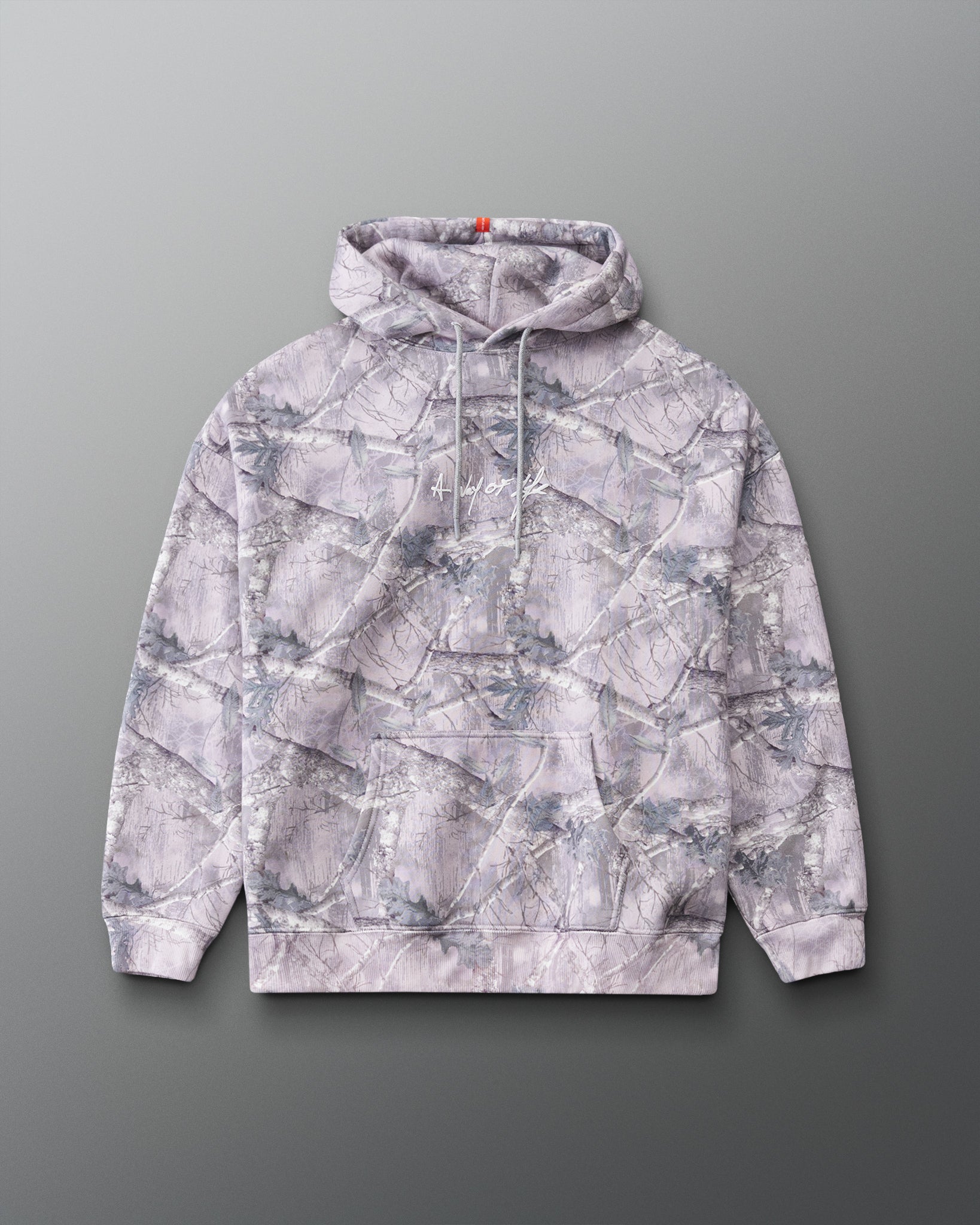 Front view of the RUDIS Faith Over Fear Relaxed Comfort Fleece Hoodie in Tree Camo, featuring an allover woodland print, drawstring hood, kangaroo pocket and white chest graphic.