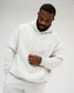 Front view of a male model wearing the RUDIS A Way Of Life Relaxed Comfort Fleece Hoodie in Heather Silver, showing tonal chest lettering, ribbed cuffs and relaxed fit.