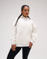 Female model wearing the RUDIS A Way Of Life Relaxed Comfort Fleece Hoodie in Heather Silver with tonal chest lettering, dropped shoulders, ribbed cuffs and kangaroo pocket.