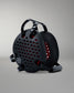 Black pet carrier with red interior on a gray background