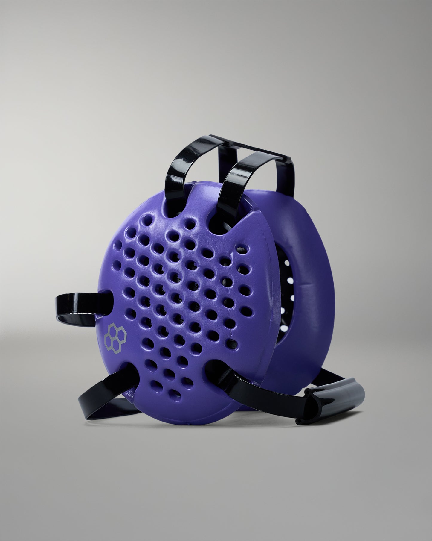 Purple device with black straps on a gray background