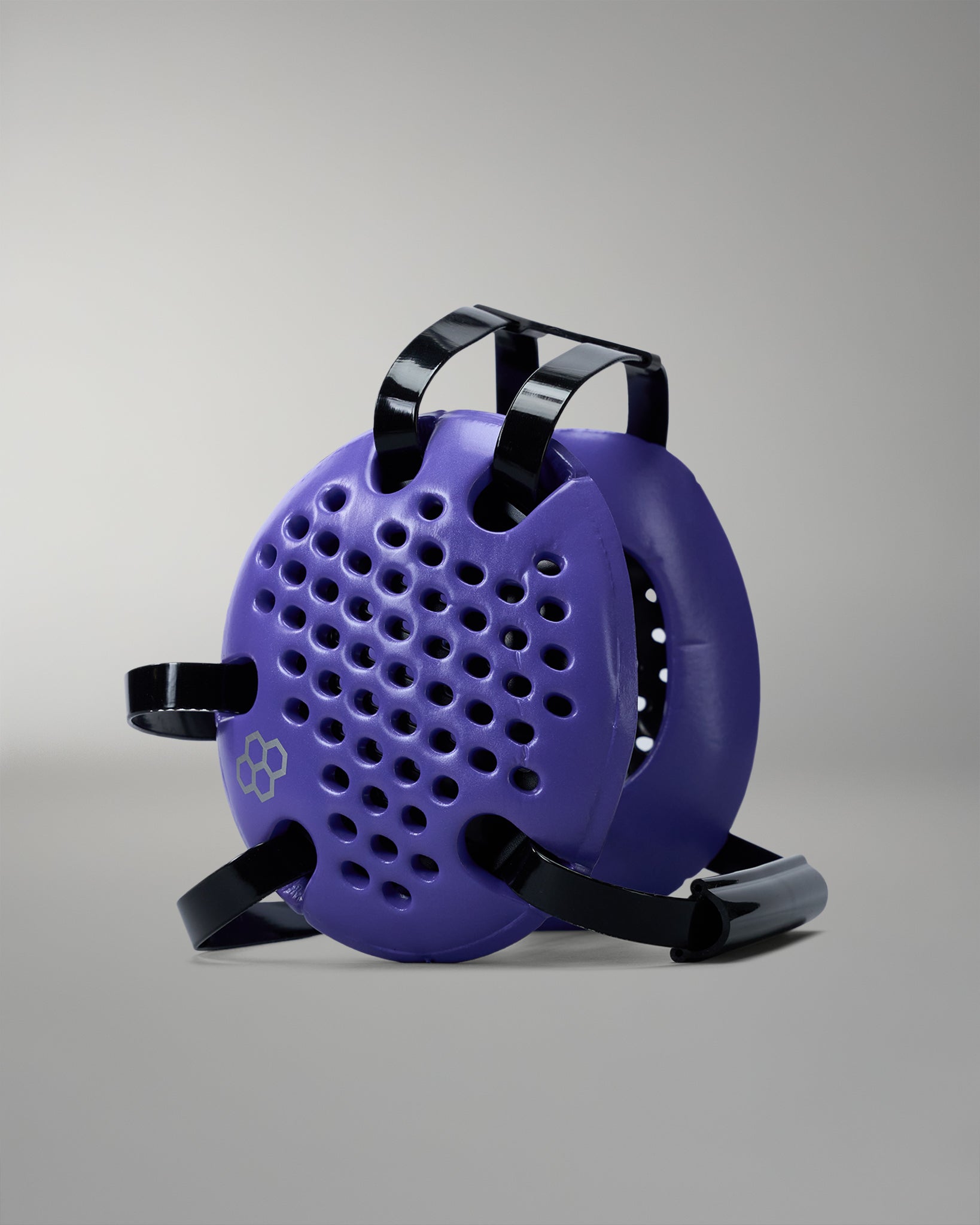 Purple device with black straps on a gray background