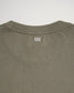 The back of a casual olive green t-shirt featuring a simple white logo printed near the neckline