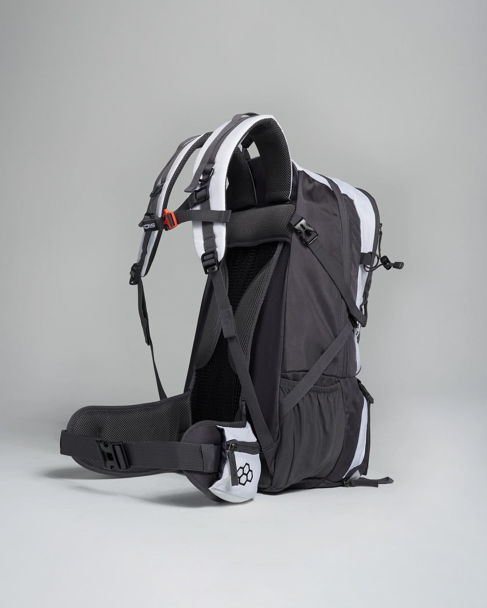 A sleek black and gray backpack with ergonomic straps and a side pocket designed for comfort and durability