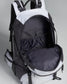 A sleek black and white multifunctional backpack featuring a spacious interior and various compartments for organization