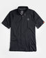 A black athletic polo shirt featuring a subtle logo made from breathable fabric and designed for comfort during physical activities