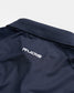 A close-up view of a navy blue sports polo featuring a textured collar and the RUDIS logo embroidered in white