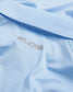 A close-up view of a light blue athletic shirt featuring the RUDIS logo in silver on the fabric