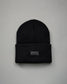 Bonnet à rabat avec patch en silicone RUDIS