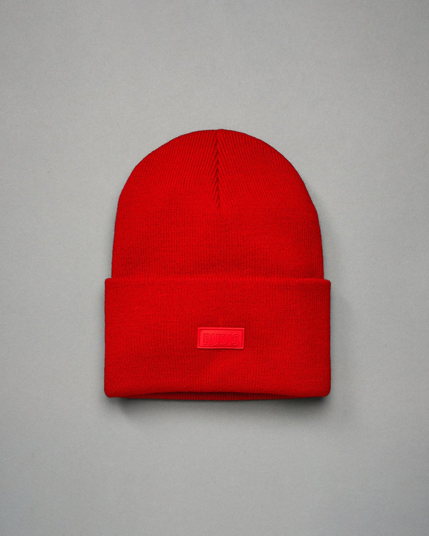 Bonnet à rabat avec patch en silicone RUDIS