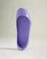 A stylish purple slip-on shoe featuring a sleek design and textured sole perfect for casual wear or outdoor activities
