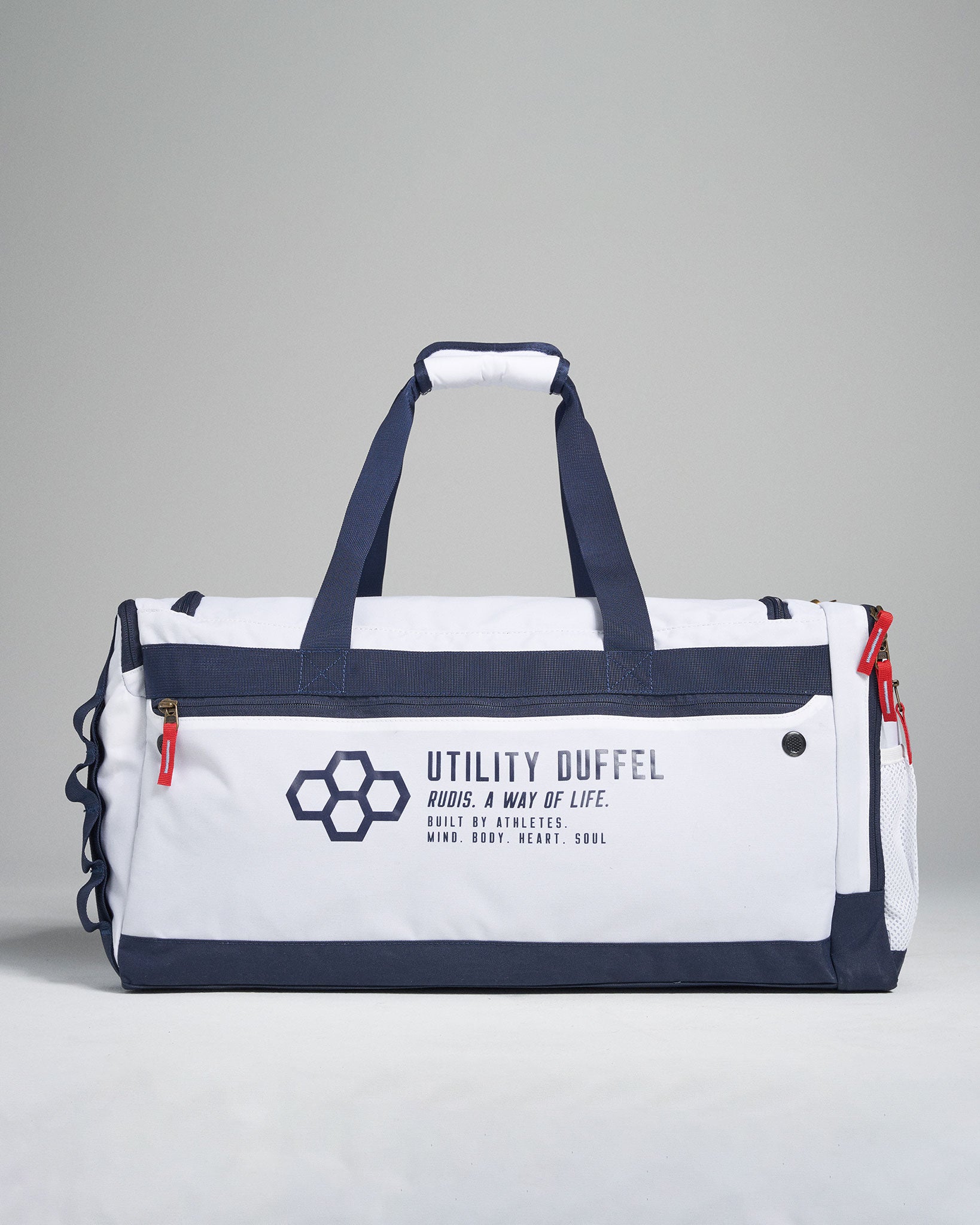 A durable white and navy utility duffel bag featuring a modern design marked with branding and built for versatility