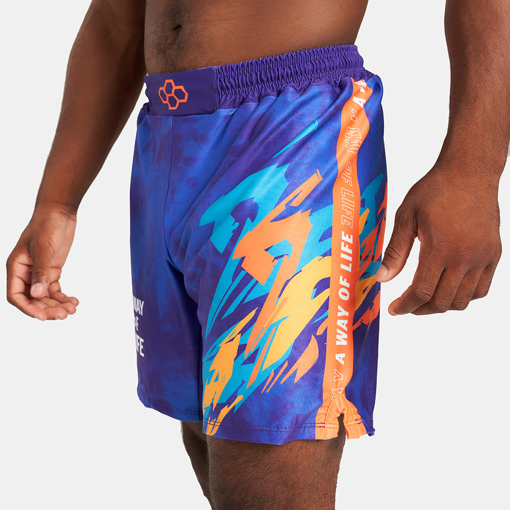 Mens vibrant swim shorts featuring a bold blue and orange design with a comfortable elastic waistband