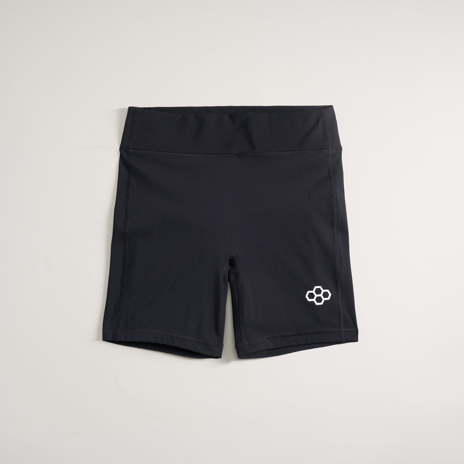 This image features a pair of black athletic shorts designed for comfort and performance showcasing a sleek fit and subtle logo detail
