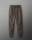Brown cargo pants on a gray background