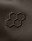 Close-up of a textured surface with a black geometric pattern on a dark gray background