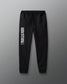 Black sweatpants with white text on a gray background