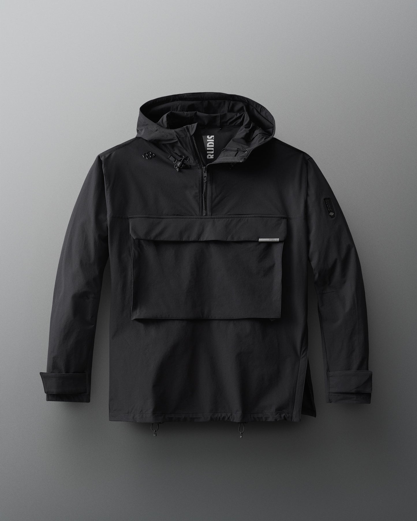 A black 1/4 zip windbreaker jacket with a hood and front gear pocket.