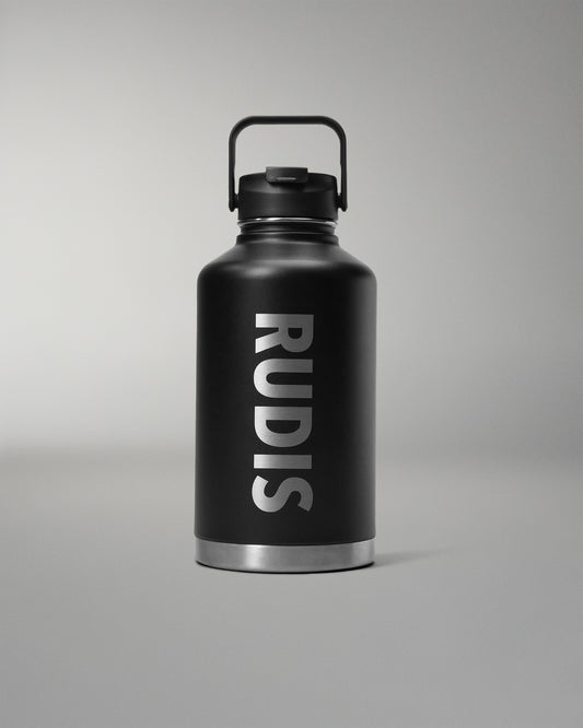 Black water bottle with 'RUDIS' branding on a gray background