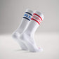 This image features a pair of white athletic socks one adorned with a blue band and the other with a red band each displaying distinct text for branding purposes