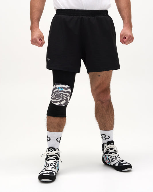 Front view of RUDIS Cushion Hypnosis Wrestling Knee Pad with black sleeve and graphic knee protection