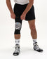 Close-up of RUDIS HPS Cushion Hypnosis Wrestling Knee Pad showing the black sleeve and Hypnosis graphic cushion