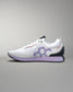 White sneaker with purple accents on a gray background