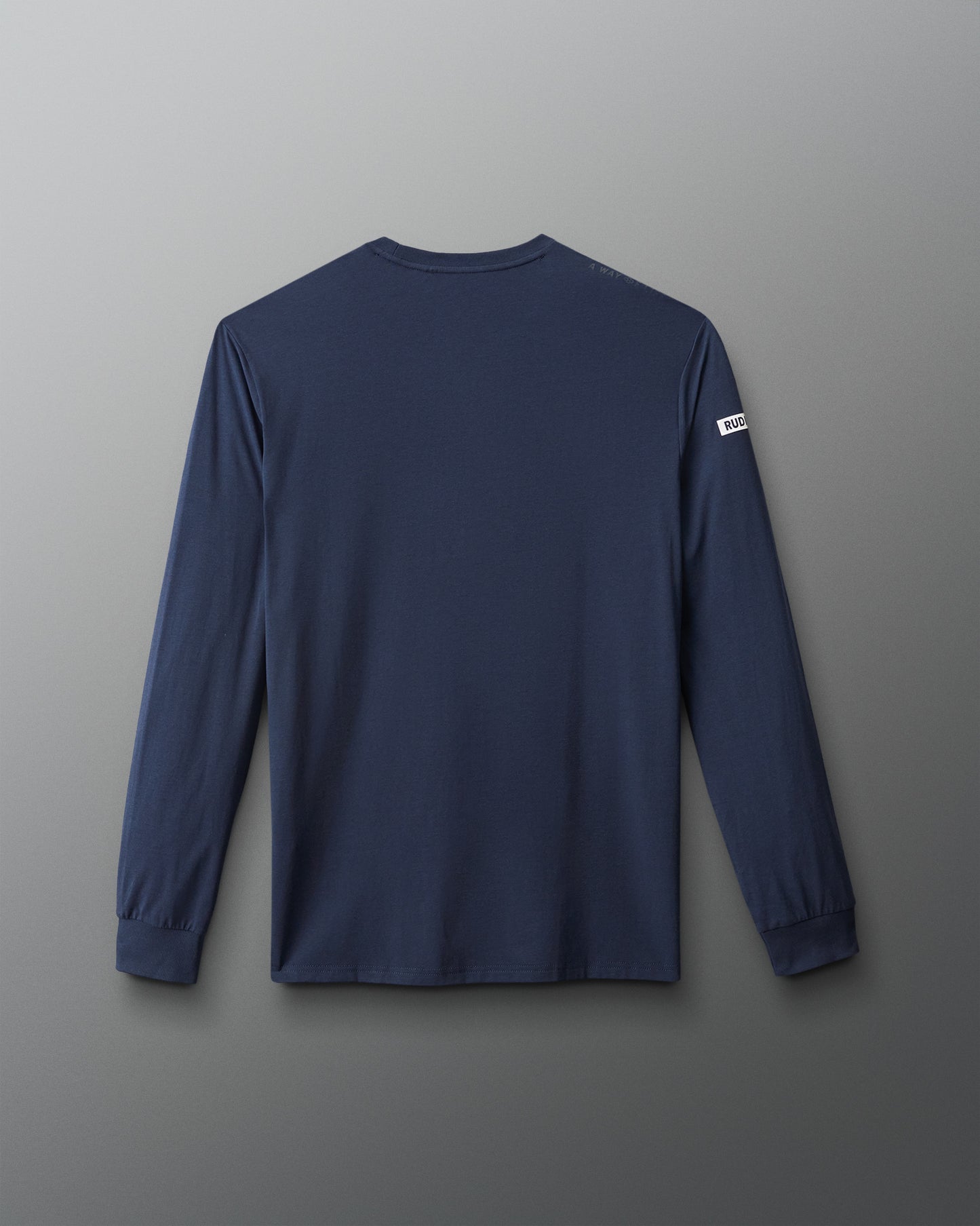 Navy long-sleeve shirt with a logo on the back against a gray background