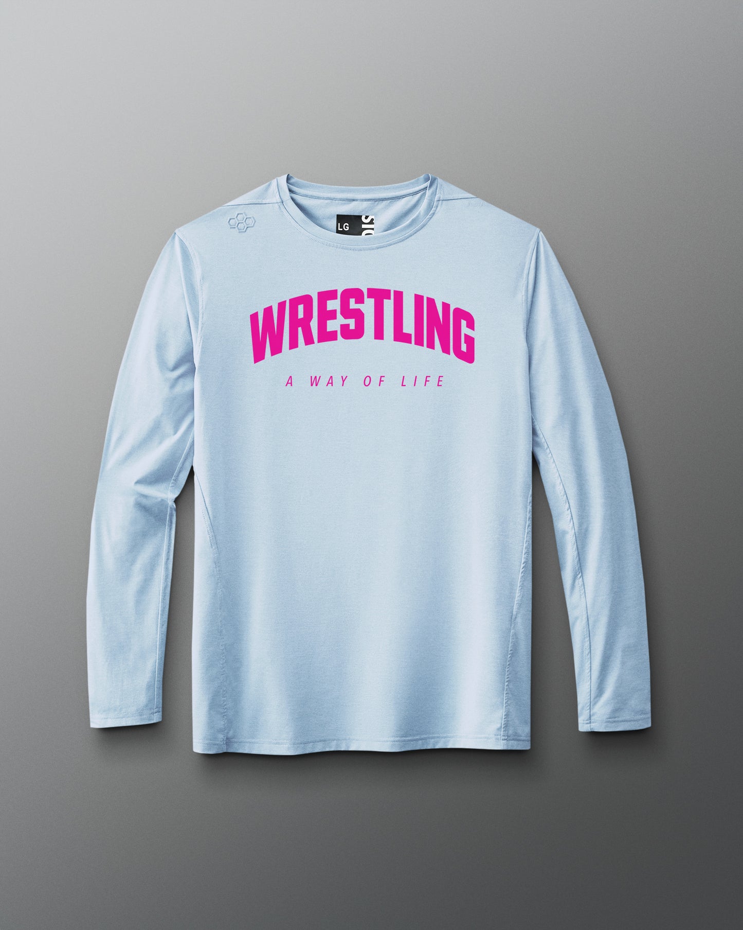 Light blue long-sleeve shirt with pink 'Wrestling A Way of Life' text on a gray background