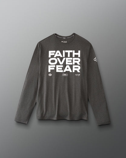 A dark gray long-sleeve athletic shirt with 'FAITH OVER FEAR' printed in bold white letters on the chest, displayed against a neutral gray background.