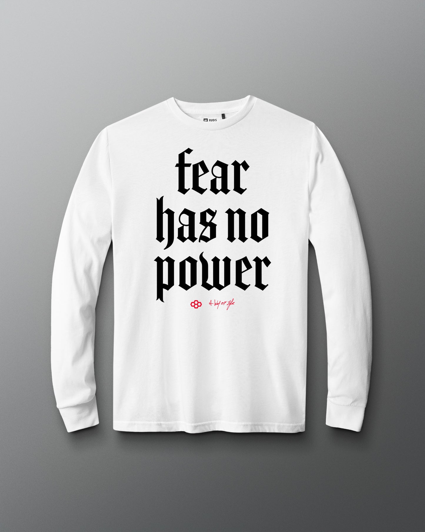 White long-sleeve shirt with 'fear has no power' text on a gray background