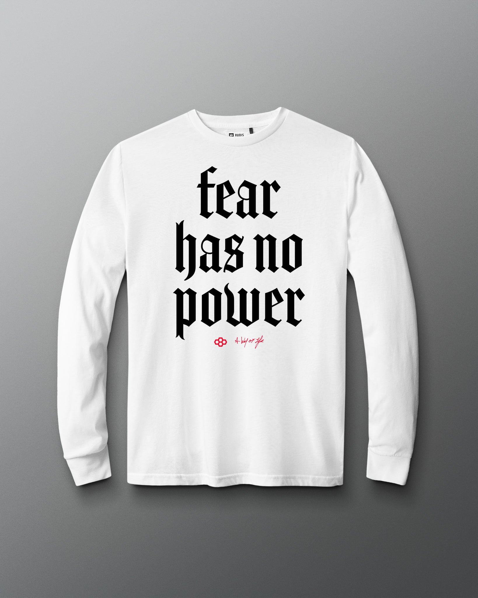 White long-sleeve shirt with 'fear has no power' text on a gray background