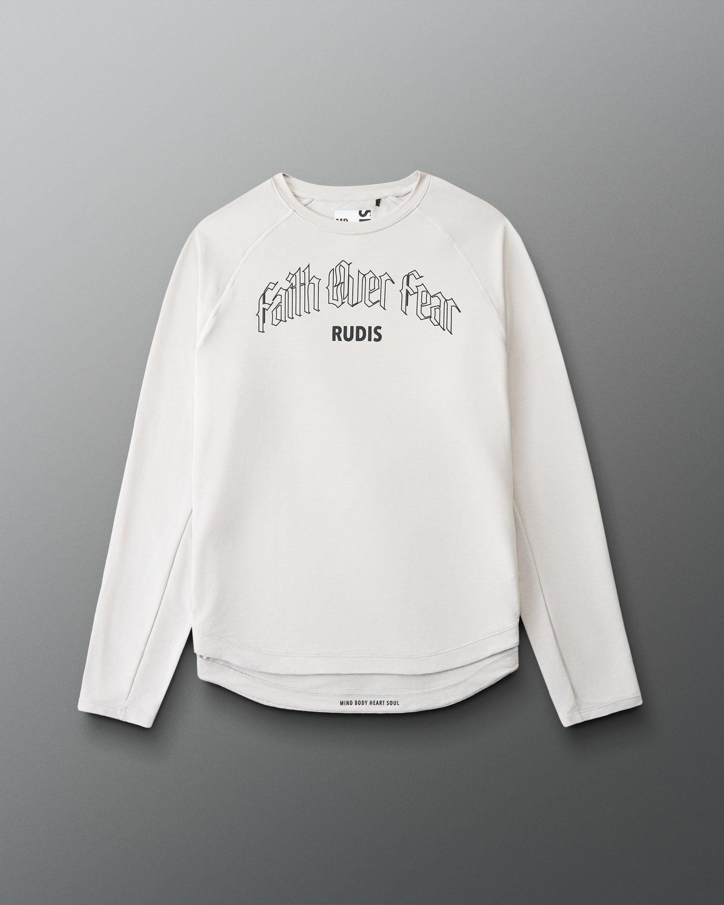 White long-sleeve shirt with 'Faith Over Fear' text on a gray background