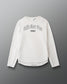 White long-sleeve shirt with 'Faith Over Fear' text on a gray background