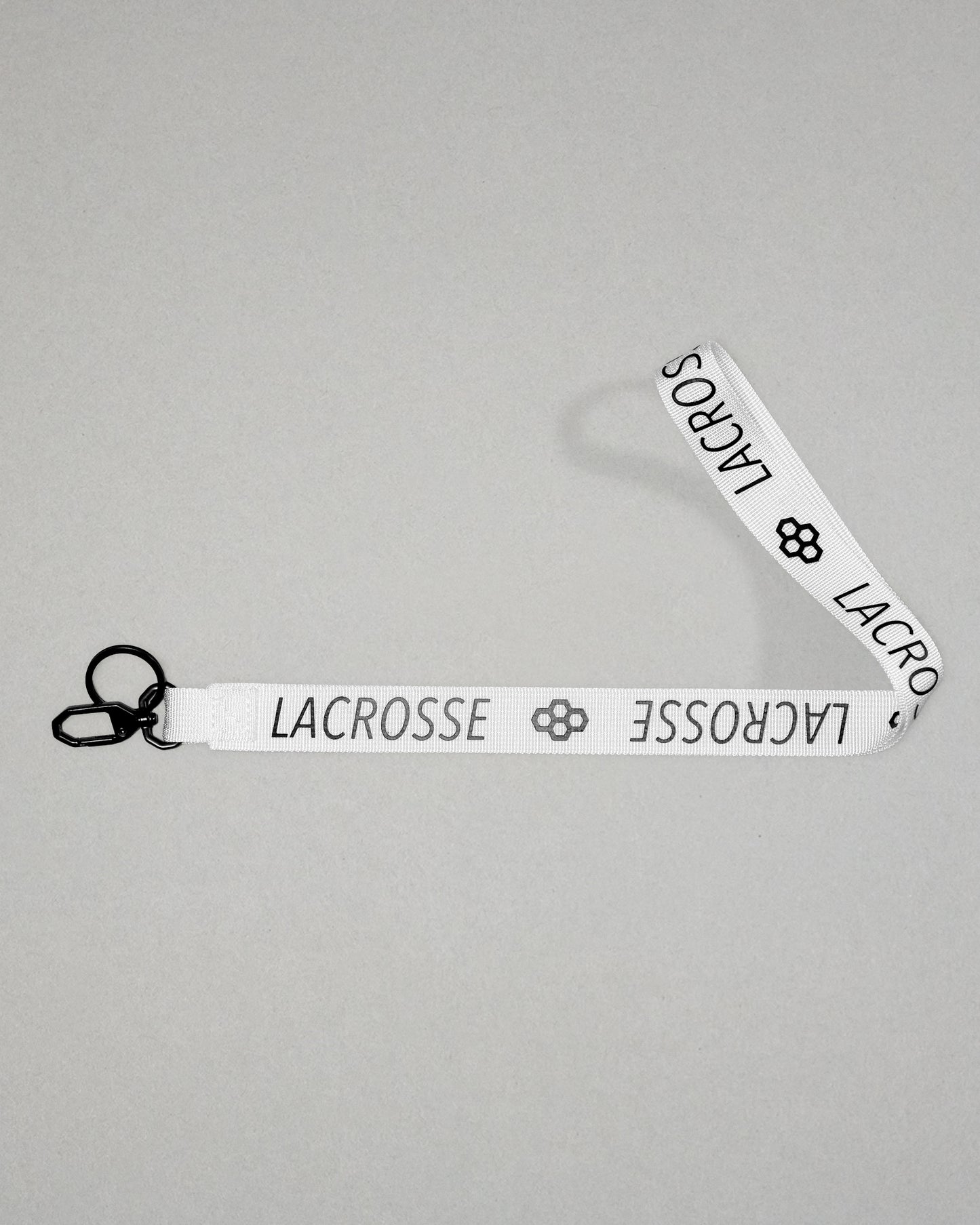 white RUDIS Lacrosse lanyard with woven logo, durable fabric strap, key ring, and metal clasp.