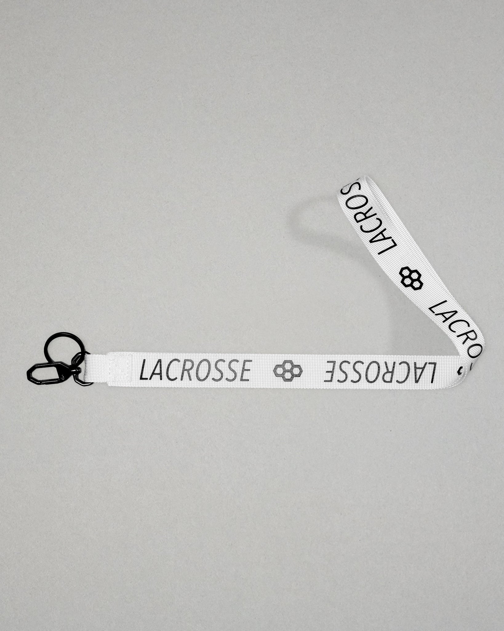 white RUDIS Lacrosse lanyard with woven logo, durable fabric strap, key ring, and metal clasp.