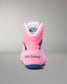 Pink wrestling shoe with 'Still Going!' text on a gray background