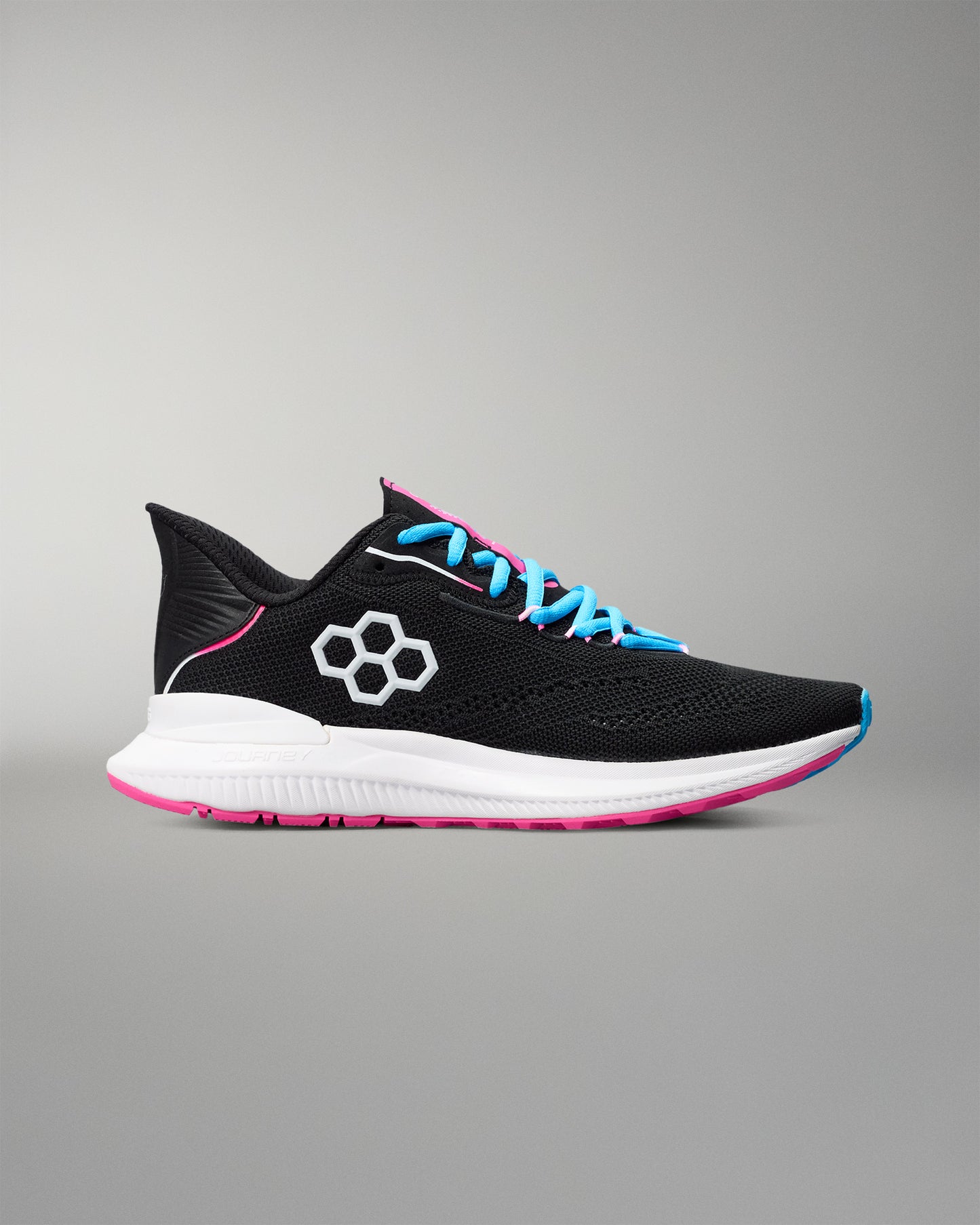 Black running shoe with blue laces and pink sole on a gray background