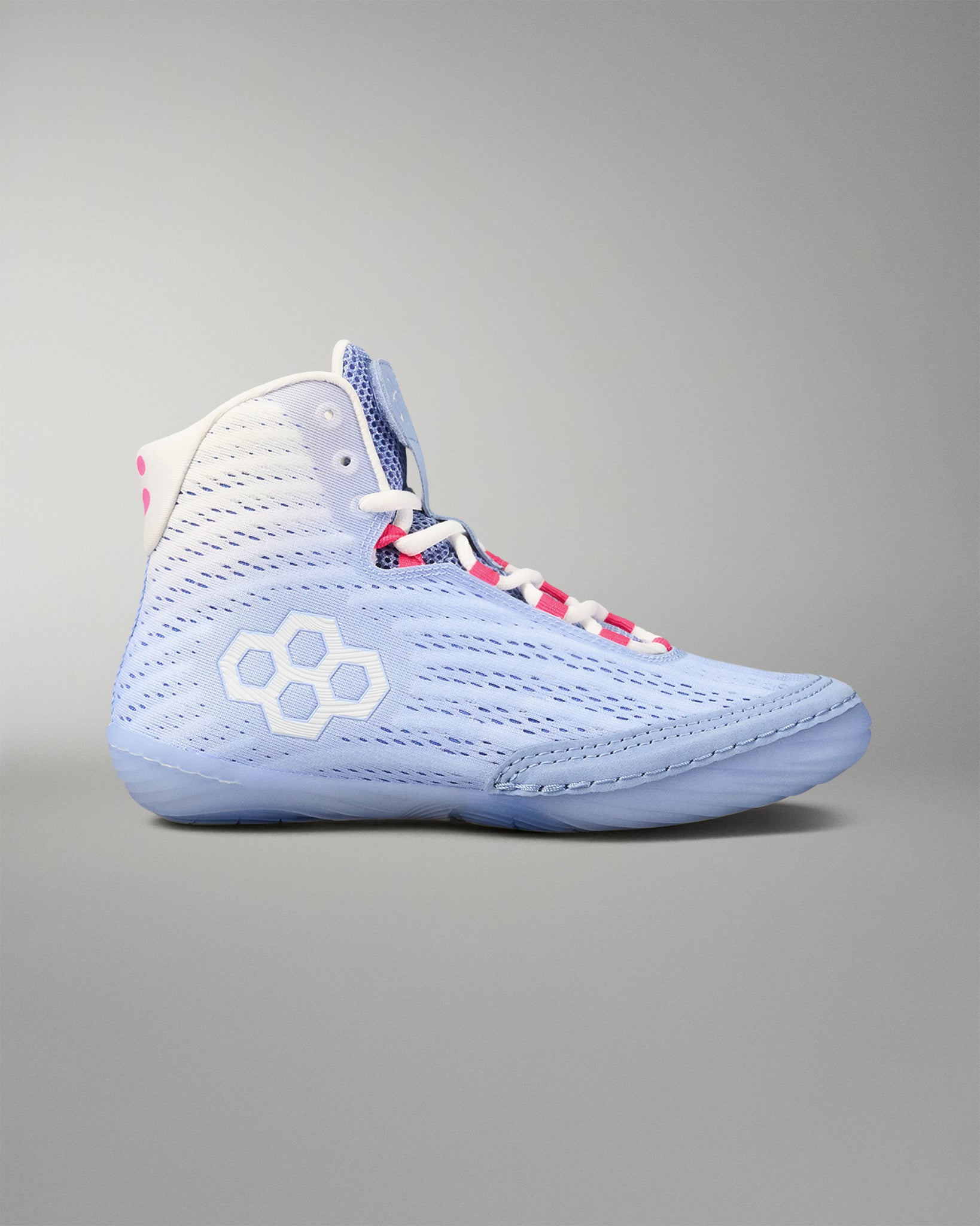 Light blue wrestling shoe with white RUDIS logo on a gray background