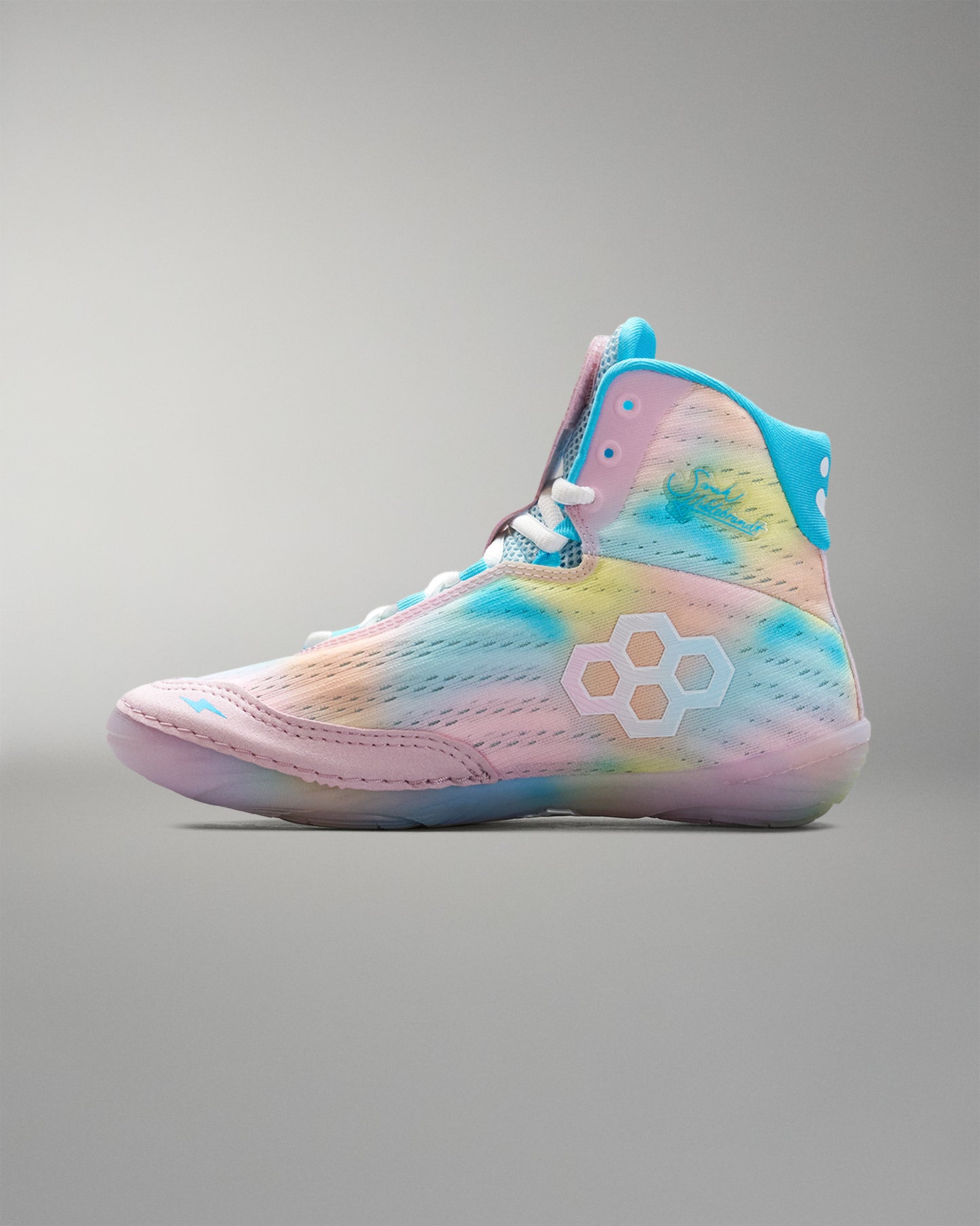 Colorful tie-dye Wrestling shoe with a brand logo on a gray background
