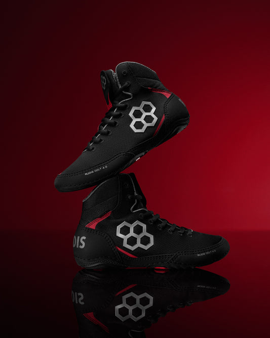 RUDIS Colt 4.0 Live Wire wrestling shoes in black with red accents, a core high-performance shoe engineered for speed, grip, and durability — built to make fast become faster.