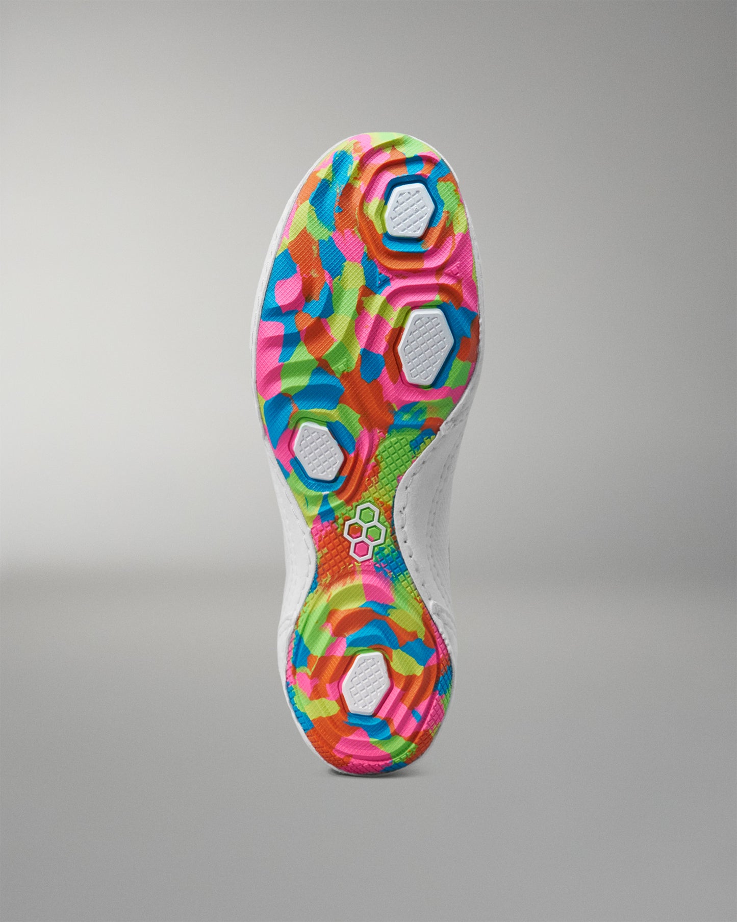 Colorful wrestling shoe sole with a geometric pattern on a gray background