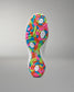 Colorful wrestling shoe sole with a geometric pattern on a gray background